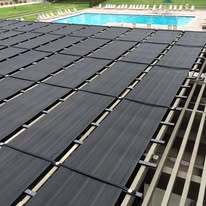 A swimming facility powered by a solar heating system.