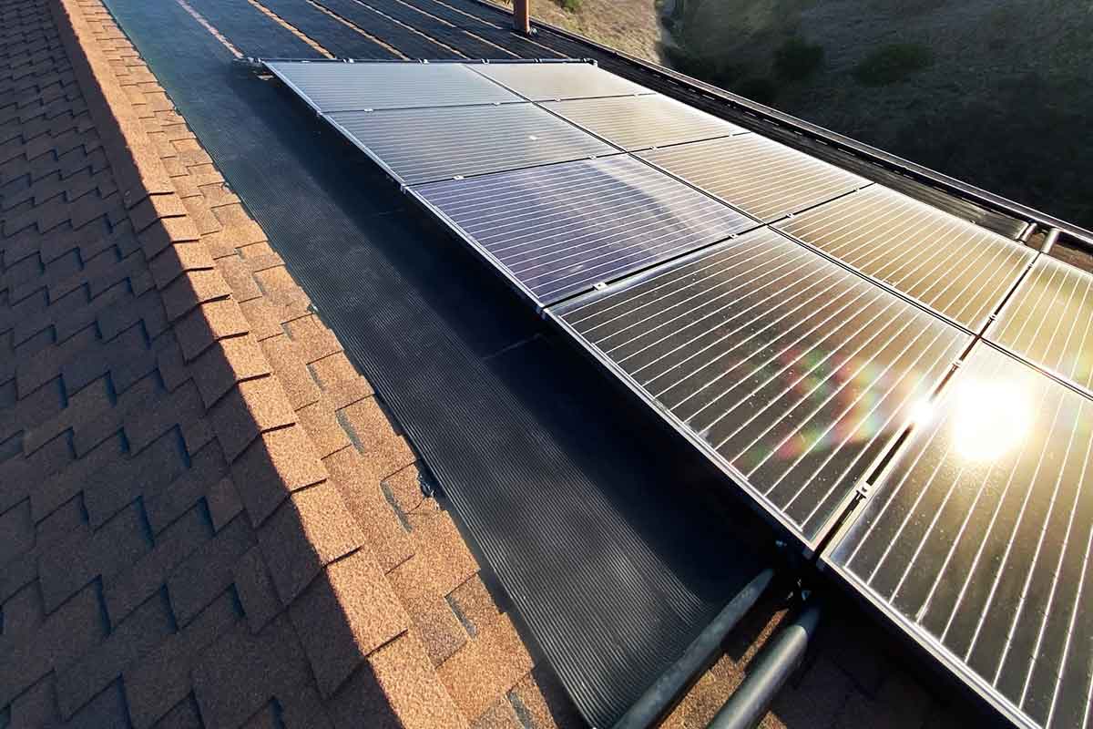 A home with solar panels visible on rooftops
