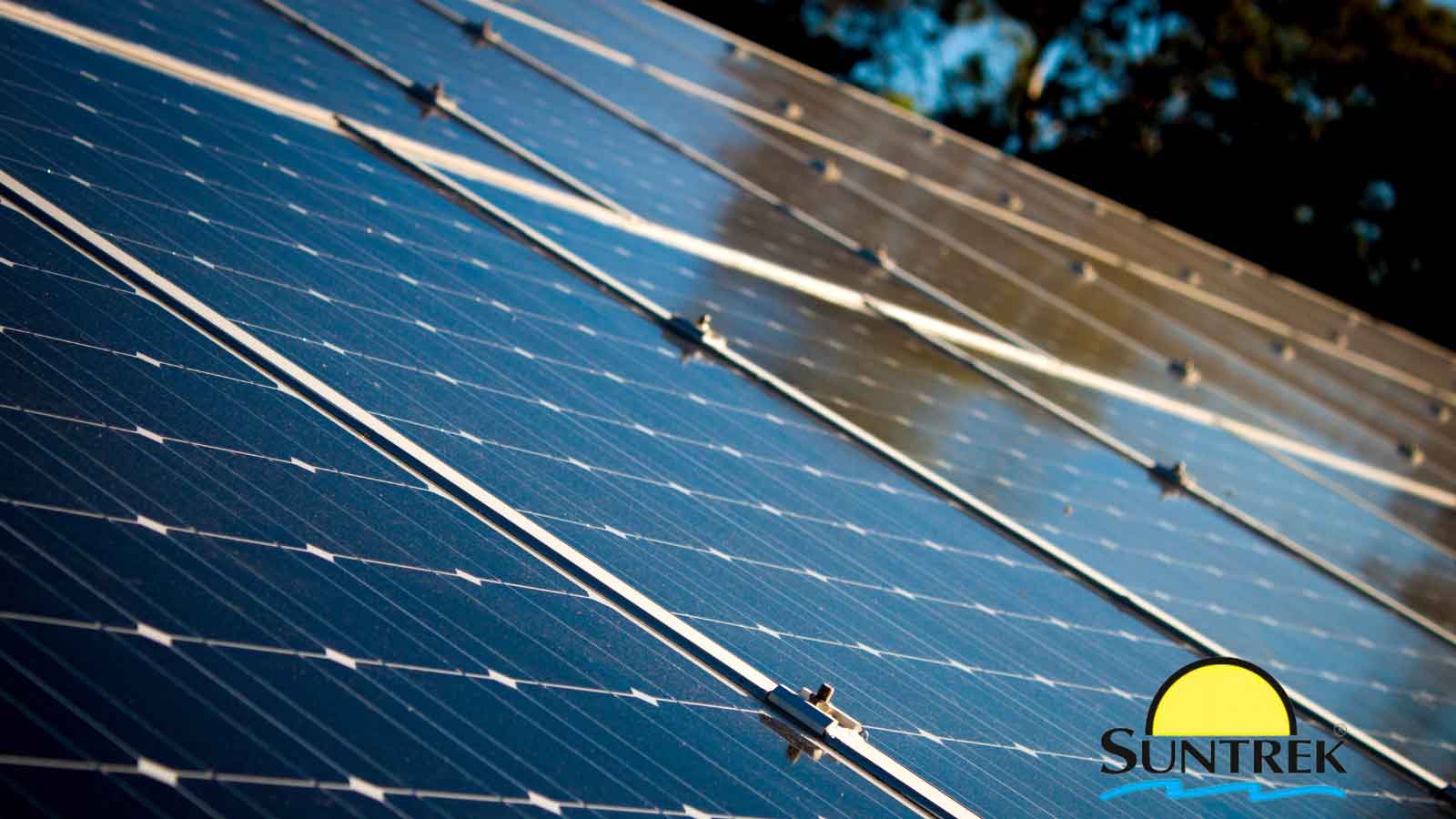 Detailed shot of solar panels mounted on a residential roof.