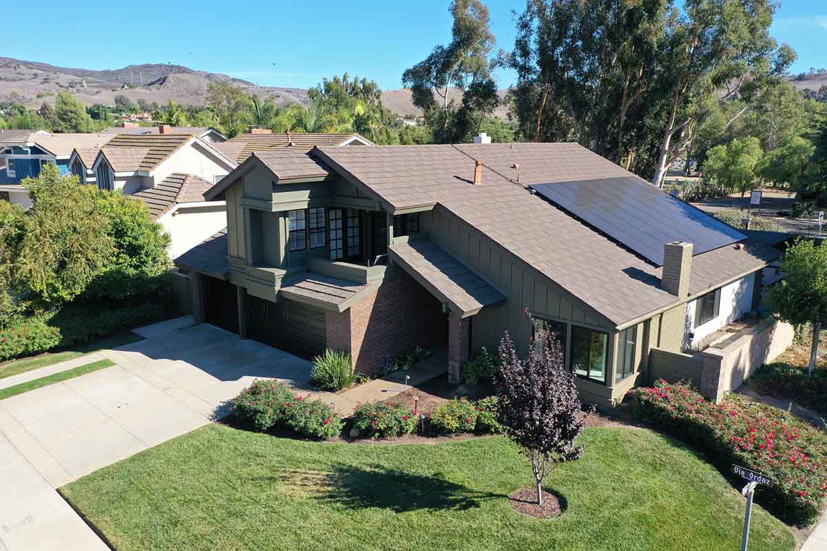 Residential house with solar panels installed on the roof.