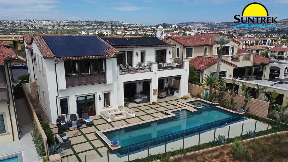 Overhead shot of a residential property with solar panels on the roof