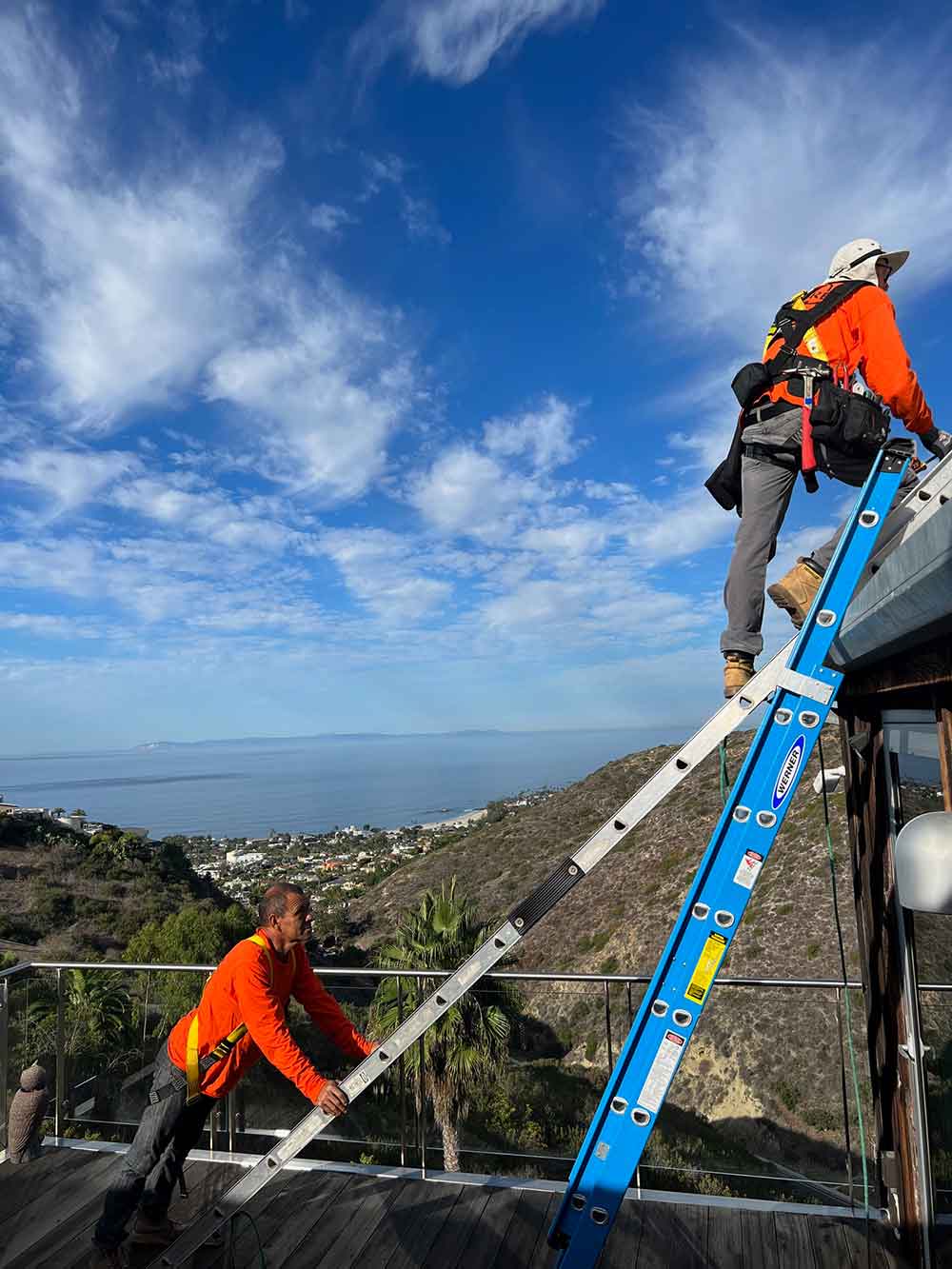 Professionals from Suntrek performing solar panel installation on a residential rooftop