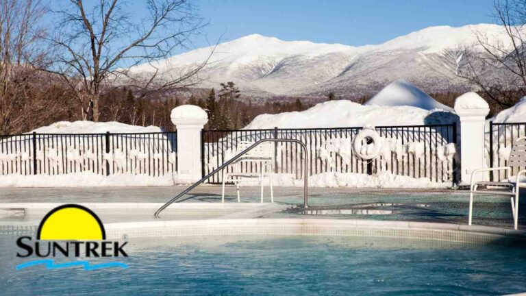 A backyard swimming pool covered with snow