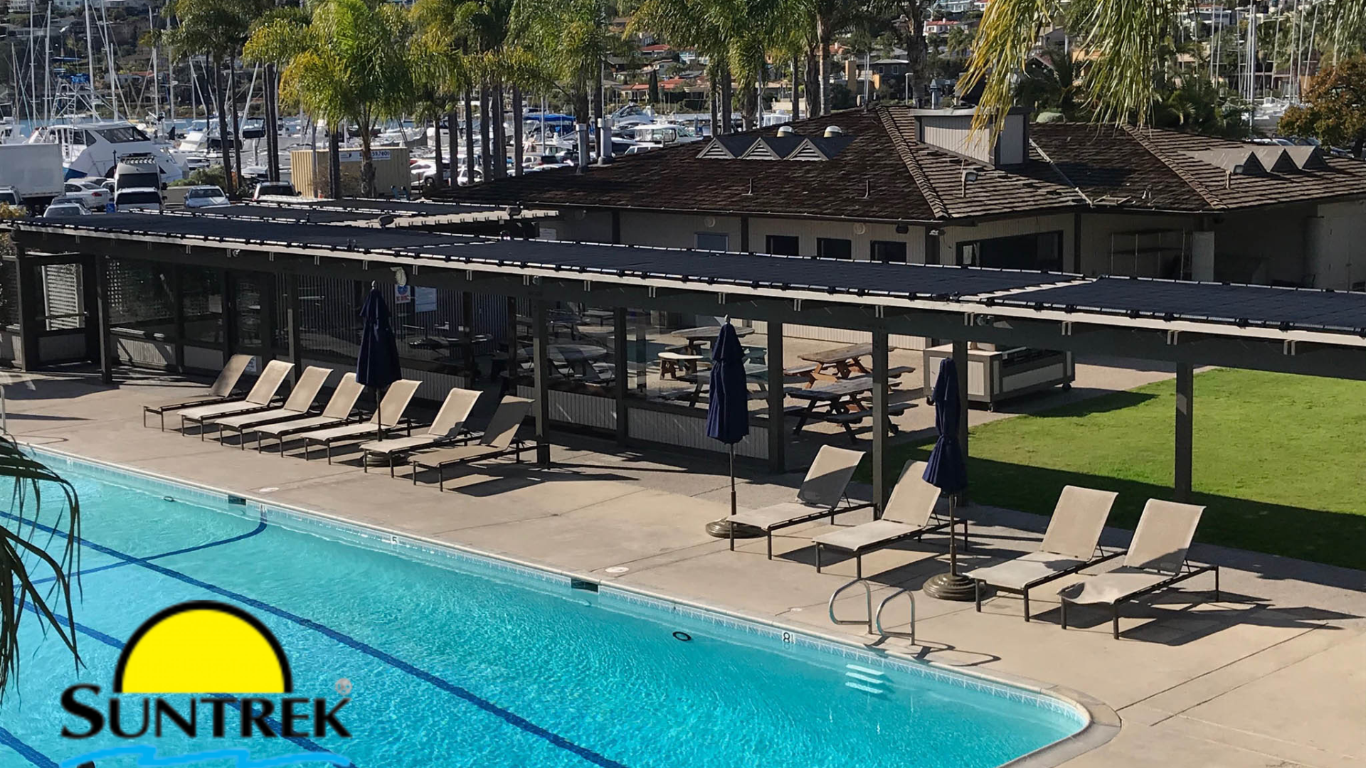 Large swimming pool using solar panels for heating