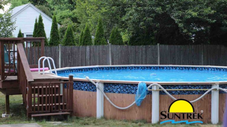 Backyard view of a house featuring an above-ground pool