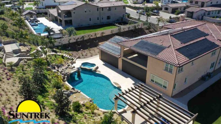 Modern backyard with pool and solar collector panels