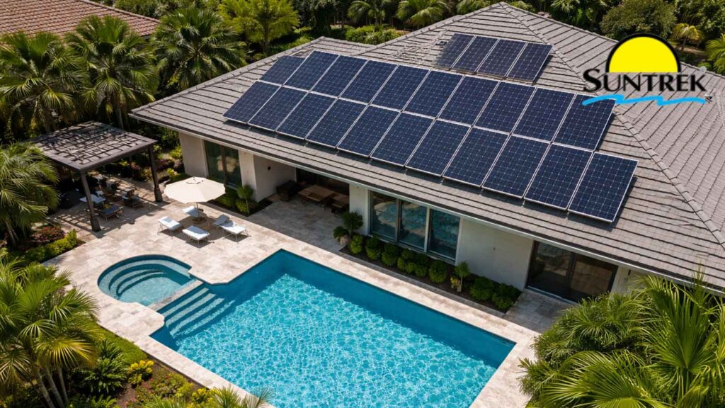 Residential house with rooftop solar panels and a backyard swimming pool.