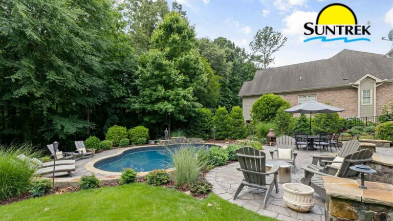 Residential house with a backyard garden with a swimming pool.
