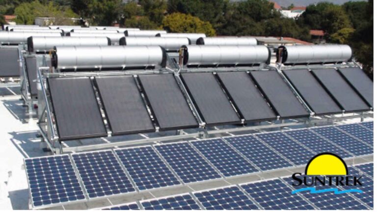 Rooftop setup with solar water heating system and panels installed.