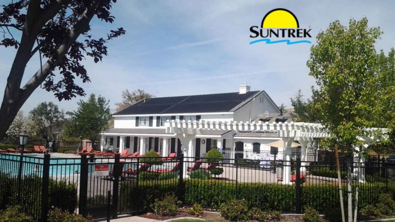 Residential home in California with a swimming pool powered by a solar pool heating system.