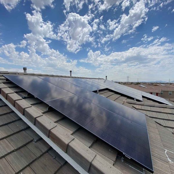 Neighborhood with solar panels visible on rooftops