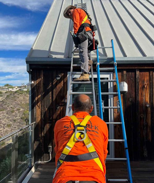 Suntrek team working on a residential roof