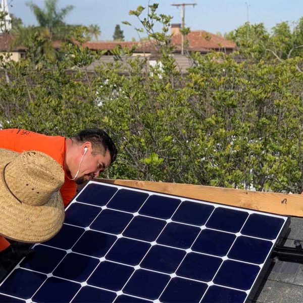 Team of Suntrek solar technicians working on a rooftop