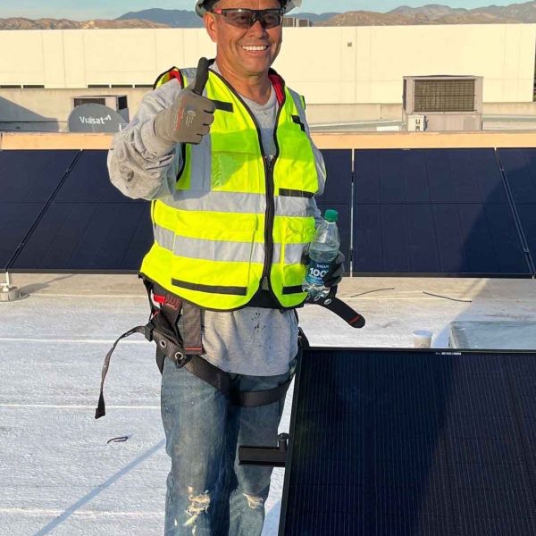 Professional Suntrek technician working on a solar panel installation