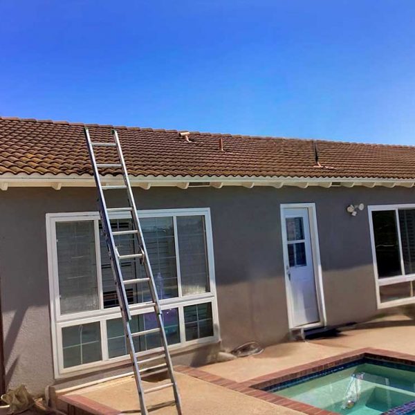 Residential property with a backyard pool, clear roof space ready for solar panel setup